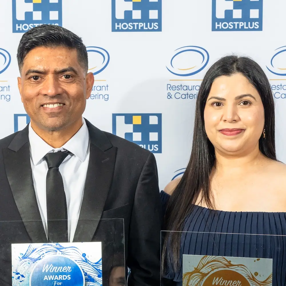 Bishnu and Anu holding 2025 Restaurant and Catering Australia awards